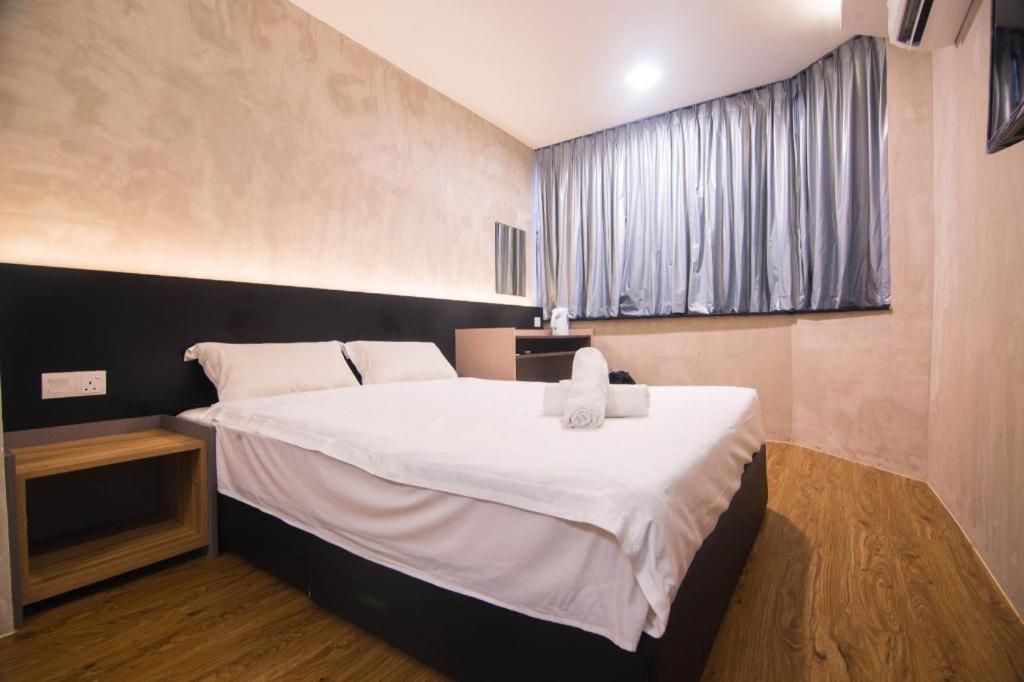 Monaco Boutique Hotel Sadong Jaya Кота-Кинабалу Экстерьер фото