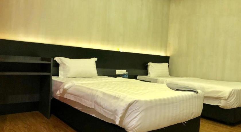 Monaco Boutique Hotel Sadong Jaya Кота-Кинабалу Экстерьер фото
