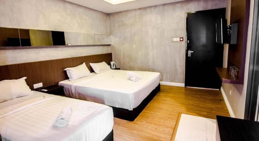 Monaco Boutique Hotel Sadong Jaya Кота-Кинабалу Экстерьер фото